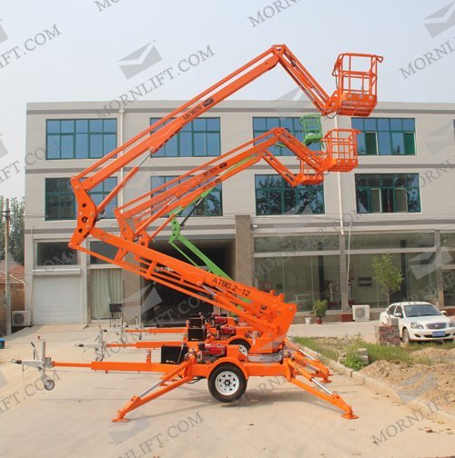 Trailing articulated boom lift 