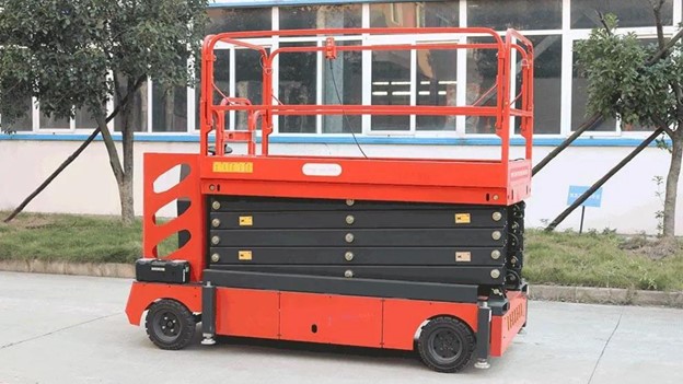Morn Scissor lift parked in a ground