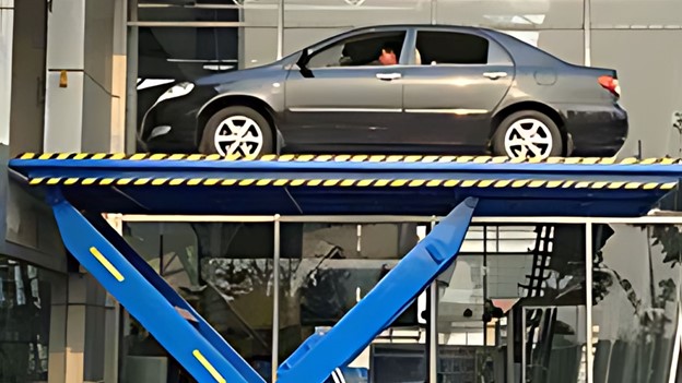 Key Features to Look for in Vehicle Loading Equipment - MORN LIFT Morn vehicle loading equipment taking car up at car showroom