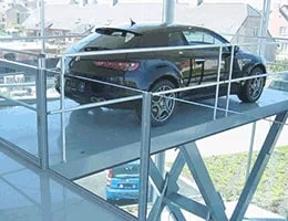 The car in standing on Morn lift vehicle ramp